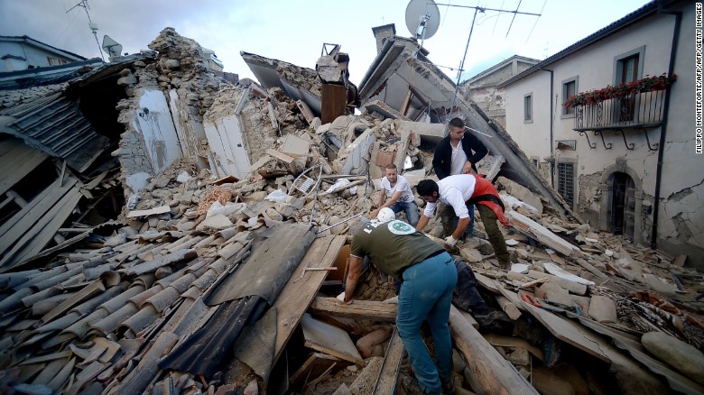 Residents search for victims in Amatrice.