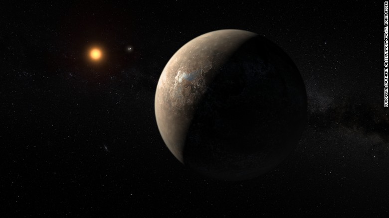 This artist&#39;s impression shows the planet Proxima b orbiting the red dwarf star Proxima Centauri, the closest star to our solar system. 