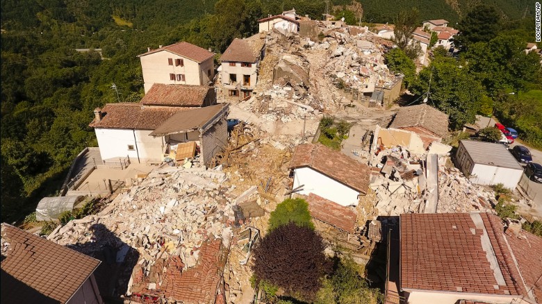 An aerial view shows the damage in the village of Saletta on August 26. Strong aftershocks in the region have rattled residents and emergency crews.