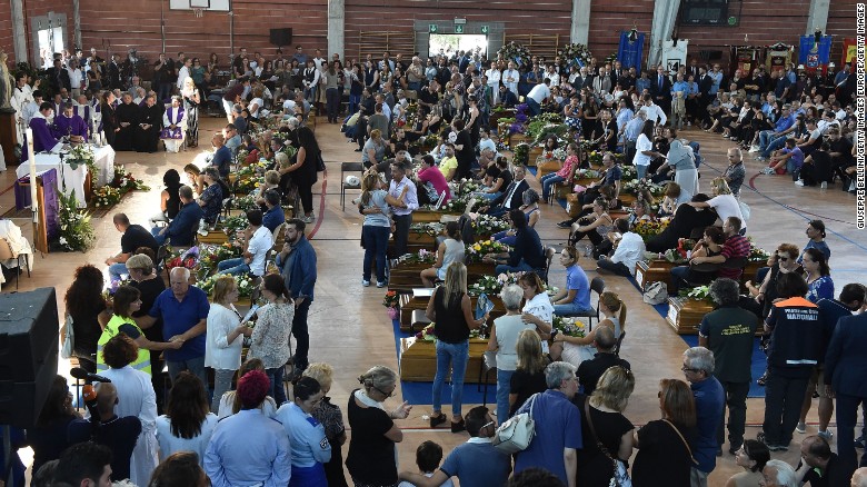 Hundreds attended the state funeral and Catholic service to lay their loved ones to rest.