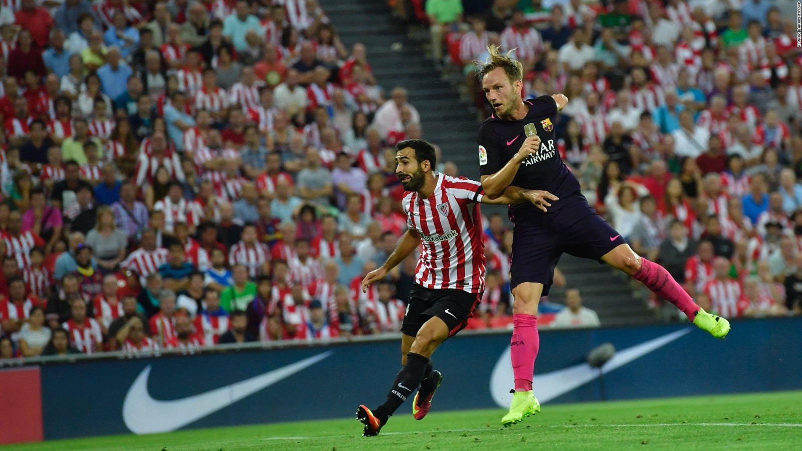 Barcelona's Ivan Rakitic heads the ball in after a delightful cross.