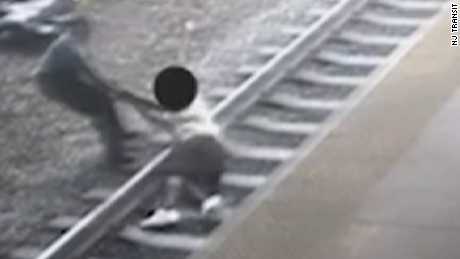 Man pulled from track just in time
