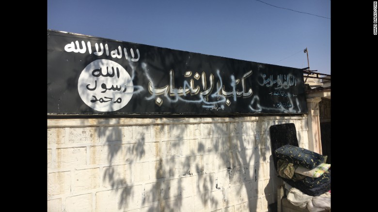 The sign in front of the ISIS recruitment center in Jarablus now has the words &quot;Free Syrian Army&quot; sprayed over it.