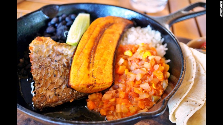 Native tubors, such as yams, are a common ingredient. Pictured, a traditional Costa Rican casado meal with rice, beans and plantain.