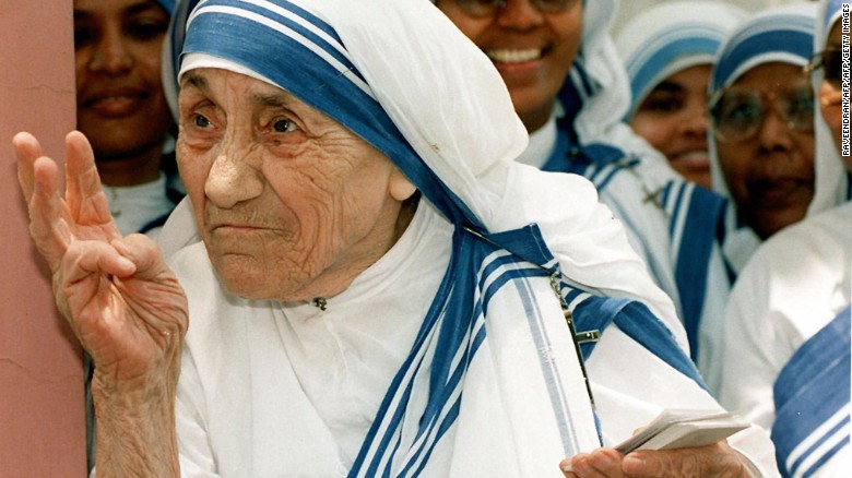 NEW DELHI, INDIA: (FILES) In this file picture taken, 15 May 1997, Mother Teresa stands with nuns of the Missionaries of Charity For Destitute Children in New Delhi. Mother Teresa will be beatified, 19 October 2003, in a ceremony in St Peter&#39;s Square, Vatican. The beatification ceremony is the penultimate step to being canonised a saint and has been the shortest in modern history. Following the beatification, a second miracle has to be verified by the Vatican before Mother Teresa can be proclaimed a saint. AFP PHOTO/RAVEENDRAN (Photo credit should read RAVEENDRAN/AFP/Getty Images)
