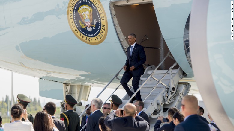 Obama arrives in China at Hangzhou airport, but no red carpet welcome for the US leader as staff bickered with Chinese officials on the tarmac. 