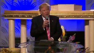 Donald Trump speaks to black voters at Detroit church