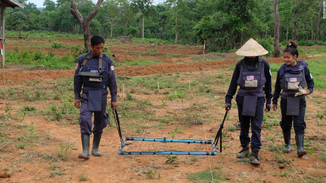The HALO Trust is the world's largest humanitarian mine clearance organization. It works in Laos to clear unexploded ordnance. Here, two HALO technicians use a Large Loop Detector to clear a hazardous area. 