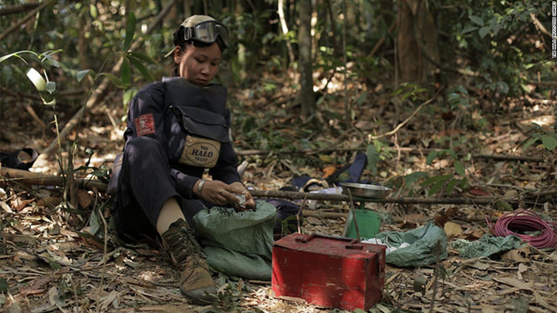 Ms Toyota, one of HALO's team leaders, prepares what she needs to conduct the demolition of a cluster munitions. 
