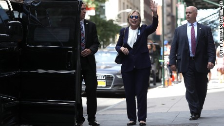 Clinton leaves 9/11 event 'overheated and dehydrated'