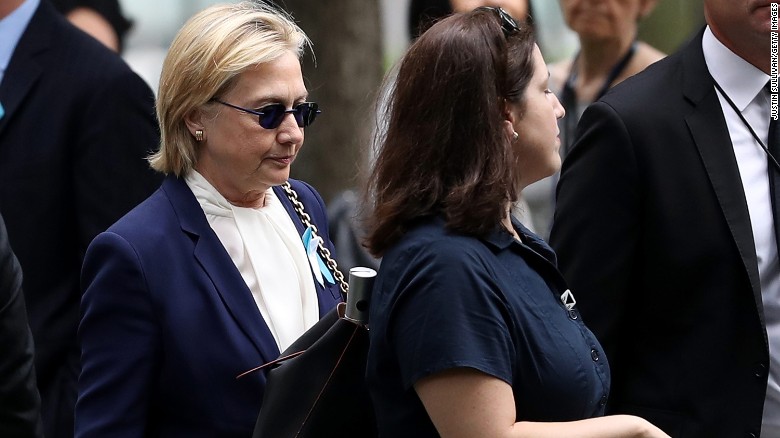 NEW YORK, NY - SEPTEMBER 11: Democratic presidental nominee former Secretary of State Hillary Clinton arrives with an unidentified woman at the September 11 Commemoration Ceremony at the National September 11 Memorial &amp; Museum on September 11, 2016 in New York City. Hillary Clinton left a September 11 Commemoration Ceremony early after feeling overheated and went to her daughter&#39;s house to rest. (Photo by Justin Sullivan/Getty Images)