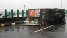 A truck is overturned in southern Pingtung county, Taiwan on September 14, 2016. The island is bracing for the impact of Super Typhoon Meranti. 