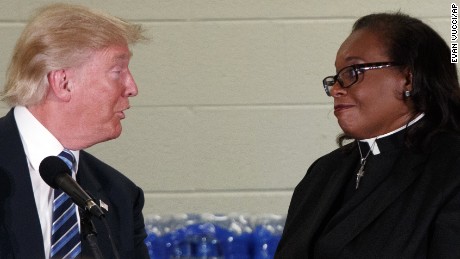 Trump goes after Flint pastor who interrupted him for attacking Clinton in church