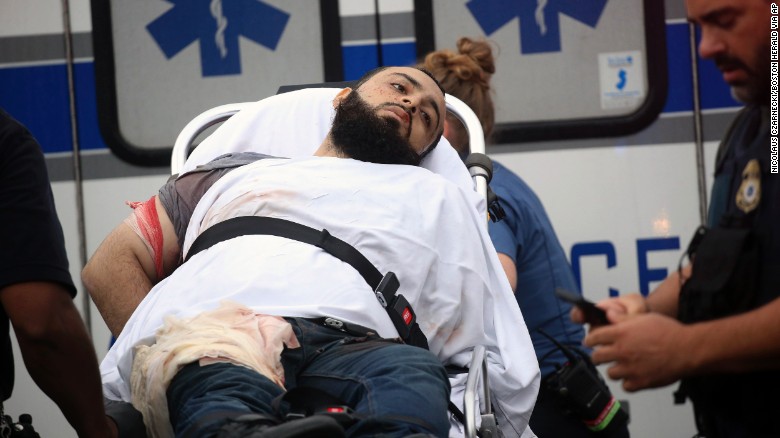 Ahmad Rahami is taken into custody after a shootout with police Monday.