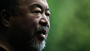 Chinese artist Ai Weiwei is pictured outside the Upper Belvedere palace in Vienna, Austria, during a preview of his exhibition on July 12, 2016.From July 14 to November 20, 2016, the 21er Haus museum presents Ai Weiwei&#39;s solo show &quot;translocation - transformation&quot;, with the central exhibit of a tea merchant familys ancestral temple from the Ming Dynasty (13681644), whose main hall will be reconstructed in the 21er Haus. / AFP / APA / HANS KLAUS TECHT / Austria OUT (Photo credit should read HANS KLAUS TECHT/AFP/Getty Images)