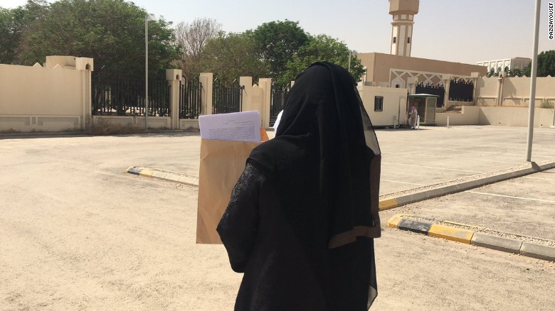 Activist Aziza Al-Yousef brings a petition opposing male guardianship system to the Royal Court in Riyadh