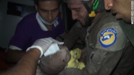 Syrian rescuer breaks down saving infant
