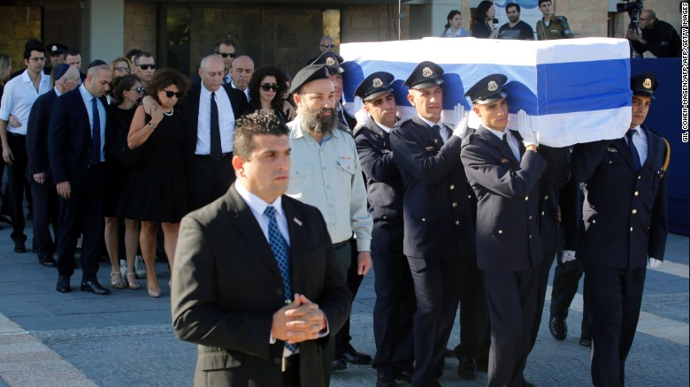 Members of the Knesset guard carry the coffin of former Israeli prime minister Shimon Peres.