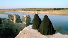 Two women look out over the Tigris from the 12th-century Bashtabiya Castle, a big part of Mosul's identity. ISIS destroyed the castle last year, according to the Iraqi Ministry of Tourism and Antiquities.