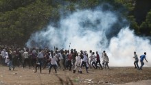 According to AFP photographer Zacharias Abubeker the event quickly degenerated, with protesters throwing stones and bottles and security forces responding with baton charges and tear gas grenades.