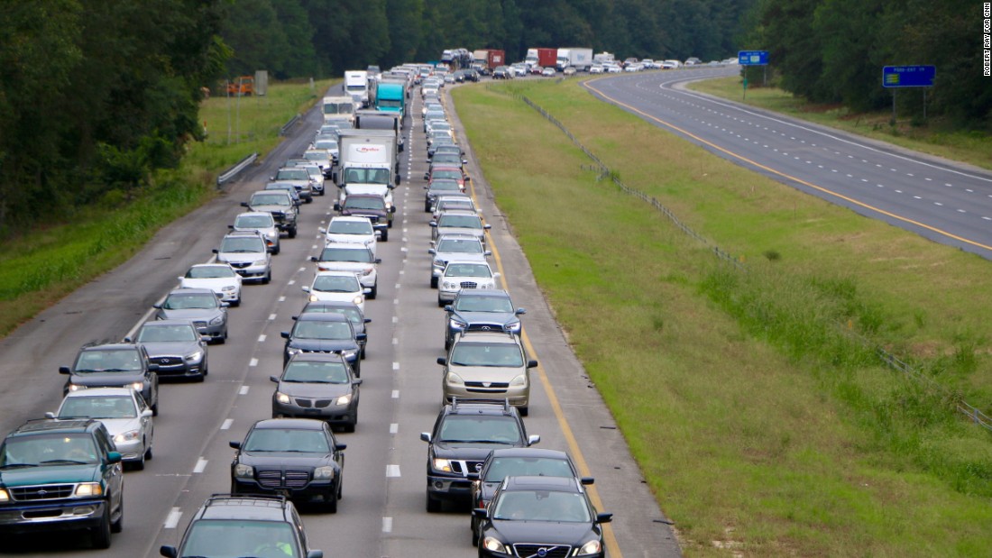 Bumper-to-bumper traffic lines Interstate 26 in Columbia, South Carolina, as people drive west on October 5.