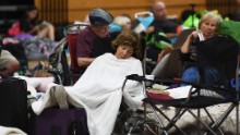 Local residents take shelter at the Pedro Menendez high school in St. Augustine, Florida, on Thursday October 6, 2016, ahead of hurricane Matthew. Some 1.5 million people are under evacuation orders in Florida in preparation for mighty Hurricane Matthew to make a direct hit on the state, the governor said Thursday. 