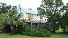 A home in Sebastian, Florida, is boarded up on October 7.