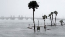 Water flows over a seawall and fills the streets of St. Augustine, Florida, on October 7.