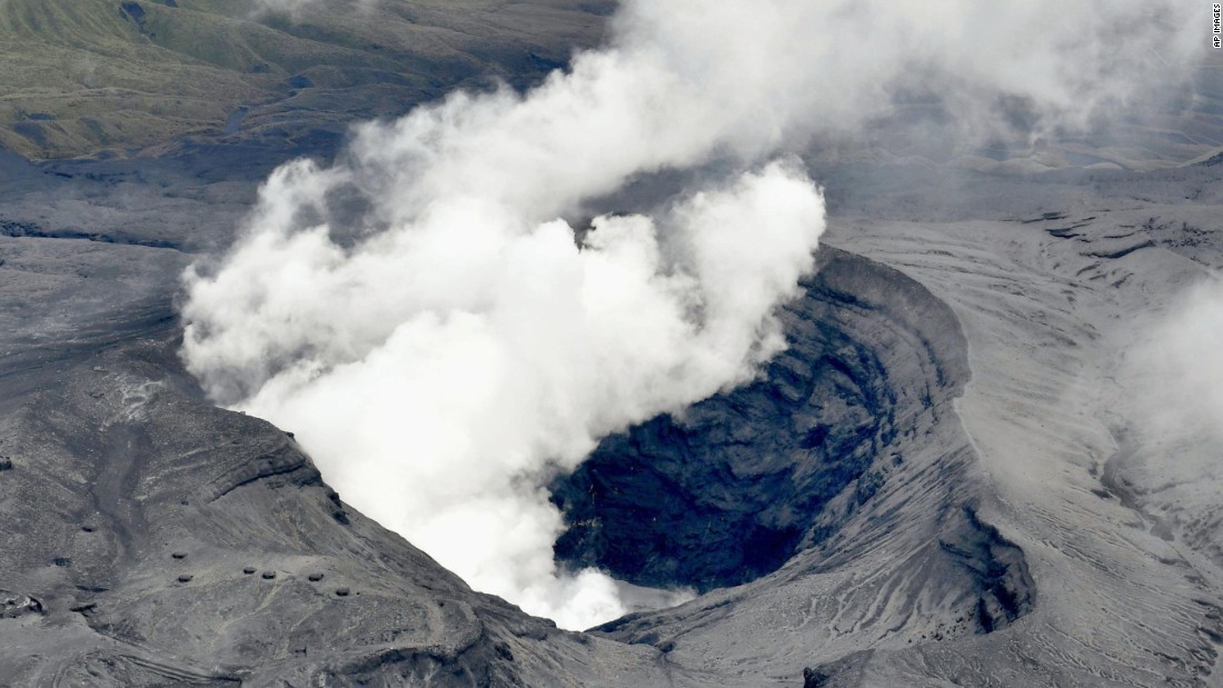 Japan&#39;s Mount Aso volcano sends a plume of ash into the air.