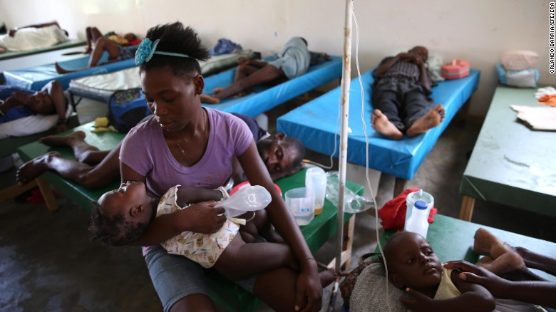 People sick with cholera receive medical assistance at Saint Antoine Hospital in Jeremie, Haiti, on Monday, October 10. Days after the storm smashed into southwestern Haiti, some communities along the southern coast have yet to receive any assistance, leaving residents who have lost their homes and virtually all their belongings struggling to find shelter and potable water.