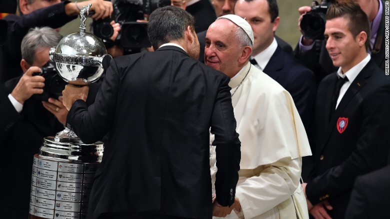 Pope Francis welcomes players of San Lorenzo to the vatican following their Copa Libertadores win.