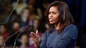 First lady Michelle Obama speaks during a campaign rally for Democratic presidential candidate Hillary Clinton Thursday, Oct. 13, 2016, in Manchester, N.H. (AP Photo/Jim Cole)