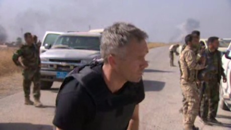 CNN reporter caught up in firefight