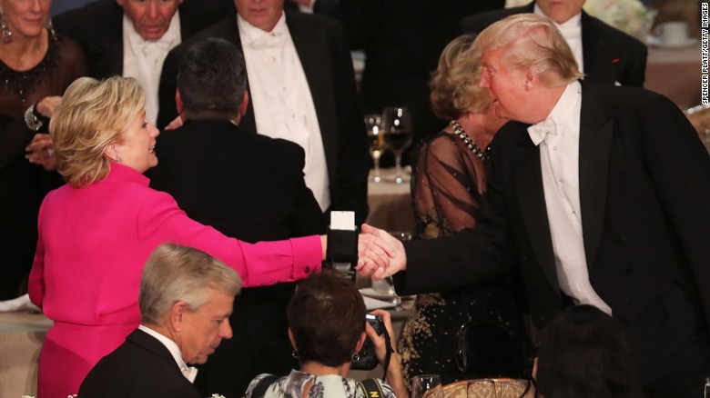 Hillary Clinton shakes hands with Donald Trump while attending the annual Alfred E. Smith Memorial Foundation Dinner at the Waldorf Astoria on October 20, 2016 in New York City.