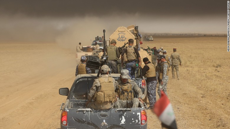 Iraqi army and militia forces arrive Thursday in Saleh village in the offensive to wrest Mosul from ISIS.