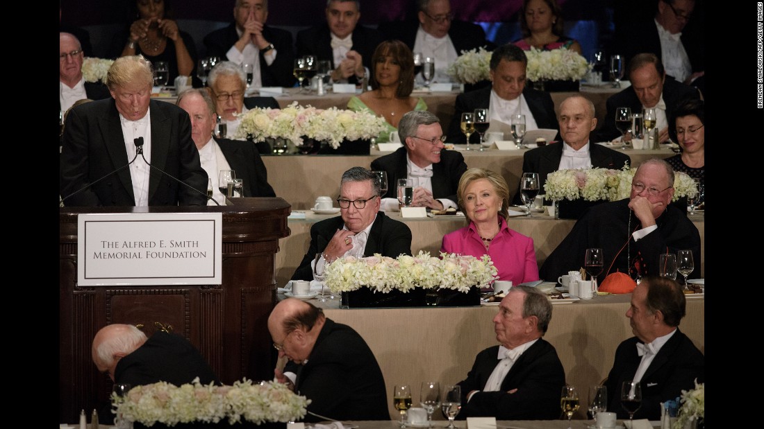 Democratic presidential nominee Hillary Clinton listens to her Republican opponent, Donald Trump, speak at &lt;a href=&quot;http://www.cnn.com/2016/10/20/politics/al-smith-dinner-hillary-clinton-donald-tump/index.html&quot; target=&quot;_blank&quot;&gt;the Al Smith charity dinner&lt;/a&gt; in New York on Thursday, October 20. The annual event benefits Catholic charities and is often one of the final opportunities for presidential candidates to share a stage before the election. Historically, it has been a good-natured roast -- but CNN&#39;s Stephen Collinson said &lt;a href=&quot;http://www.cnn.com/2016/10/21/politics/al-smith-dinner-hillary-clinton-donald-trump-campaign/index.html&quot; target=&quot;_blank&quot;&gt;Clinton and Trump struggled to disguise the anger, bitterness and sheer open dislike&lt;/a&gt; that has pulsed through the race.