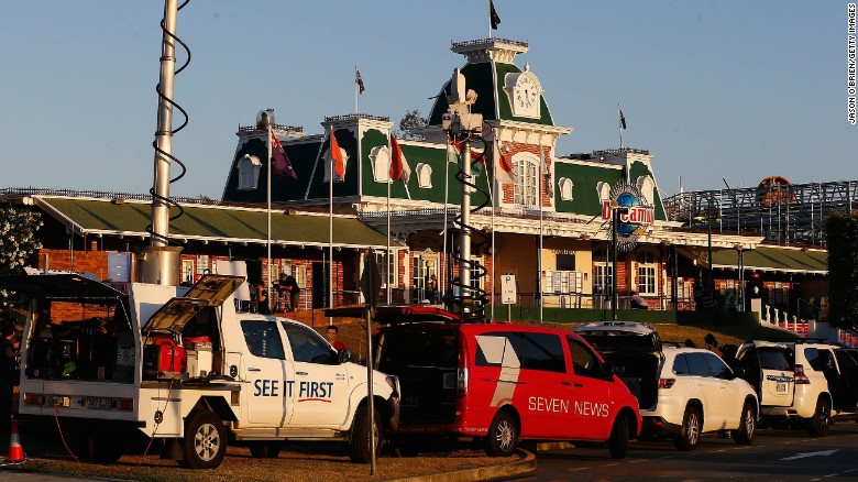 Emergency vehicles are seen in front of Dreamworld after a ride malfunctioned.