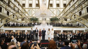 Trump mixes business and politics with opening of new hotel