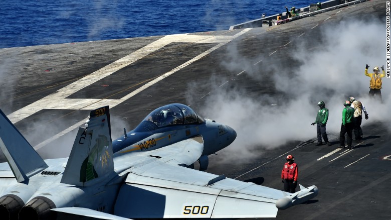 An F/A-18F Super Hornet takes off from the US navy&#39;s super carrier USS Dwight D. Eisenhower (CVN-69) (&quot;Ike&quot;) in the Mediterranean Sea on July 7, 2016. The US aircraft carrier is deployed in support of Operation Inherent Resolve, maritime security operations and theater security cooperation efforts in the US 6th Fleet area of operations. Air Wings embarked aboard conducted strikes against the terrorist group ISIL in Libya, Iraq and Syria. / AFP / ALBERTO PIZZOLI (Photo credit should read ALBERTO PIZZOLI/AFP/Getty Images)