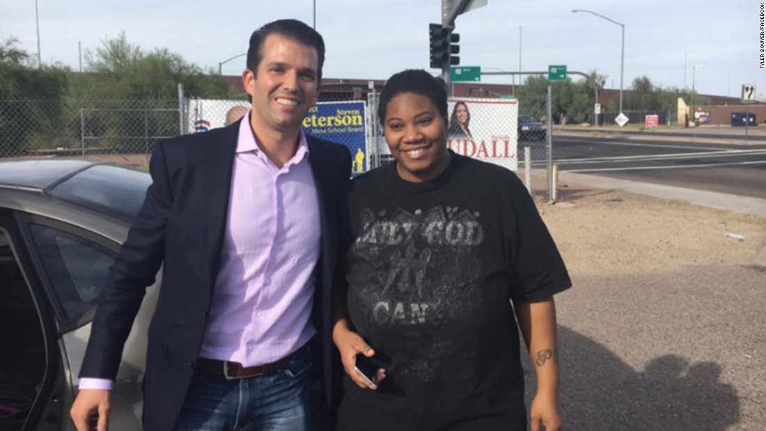 Donald Trump Jr. helps a woman push her stalled car in Arizona
