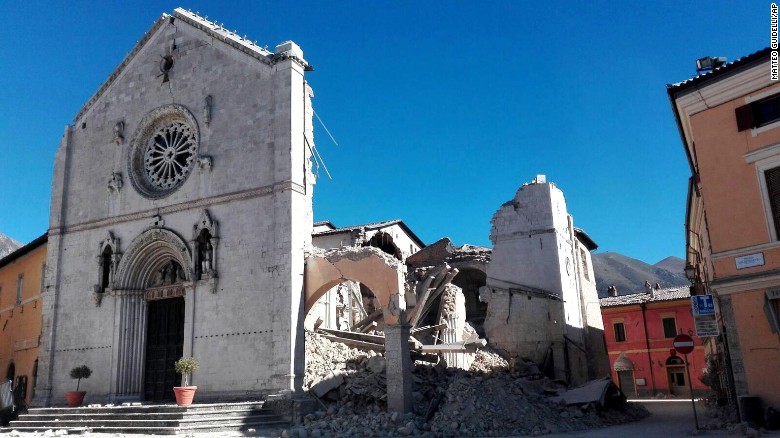 The Basilica of San Benedetto&#39;s facade remains standing in Norcia, but its core crumbled Sunday.