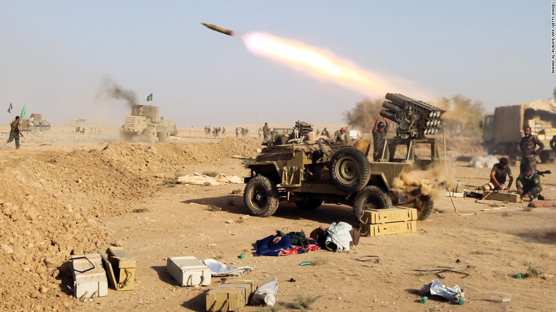 Shiite fighters from the Hashed al-Shaabi launch missiles on the village of Salmani, south of Mosul, on Sunday, October 30. An Iraqi-led offensive is underway to reclaim Mosul, Iraq&#39;s second-largest city and the last major stronghold for ISIS in the country.