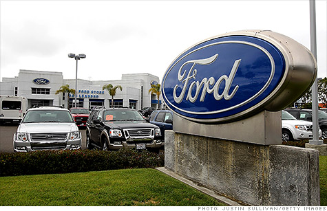 Ford Motor's earnings weighed down by the economic crisis in Europe, despite a persistent rebound in U.S. car sales.