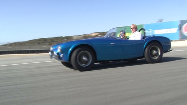 Behind the wheel of the first Shelby Cobra