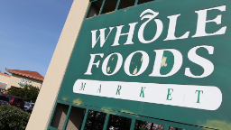 Why Whole Foods restricts executive pay