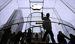 Apple profit soars but iPads slump