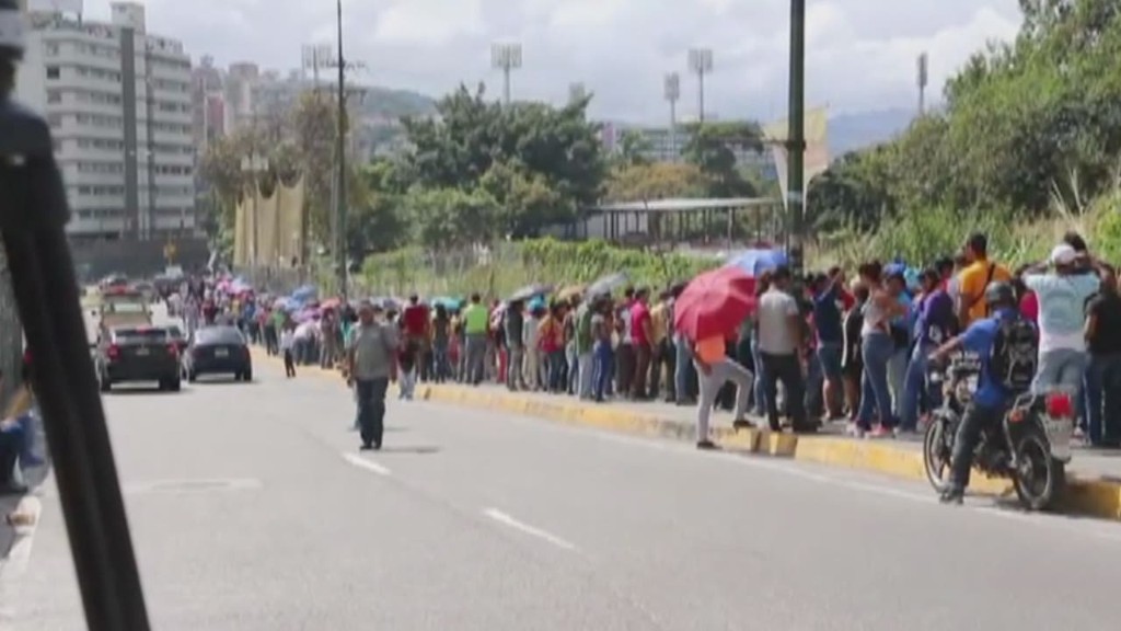 Venezuelans face long lines for basics