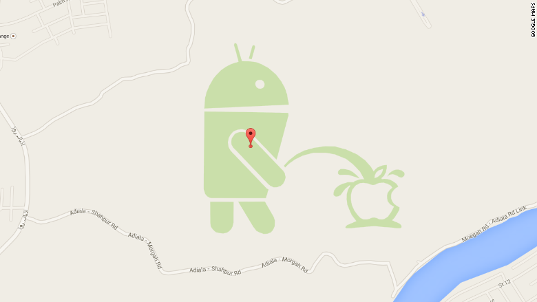 Android peeing on apple