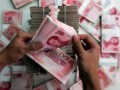 China's yuan devaluation turns up heat on Asia