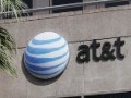 AT&T CEO pledges journalistic independence
